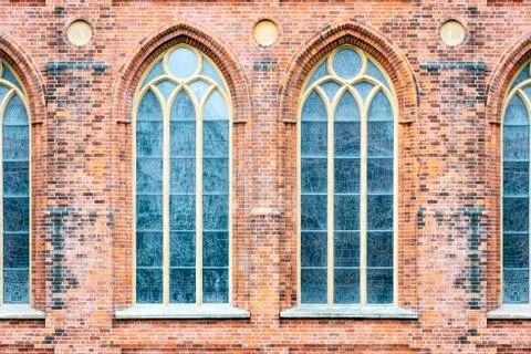 Windows on brick wall. Stock Photos