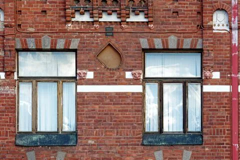 Windows on a brick wall. Stock Photos