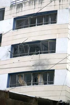 Windows broken by terrorists bomb attack near Nariman house in year 2008 ;... Stock Photos