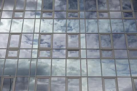 Windows in building. Mirror surface in building. 스톡 사진