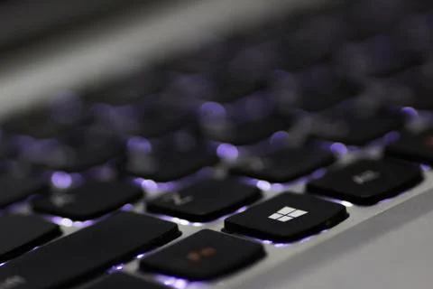 Windows button focussed in a backlit windows keyboard Stock Photos
