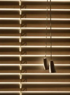 Windows closed blinds, sun protection on a bright day. Фото