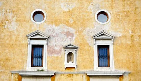 Windows on decay wall building Stock Photos