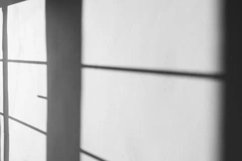 Windows frame reflection on the wall, texture or background Stock Photos