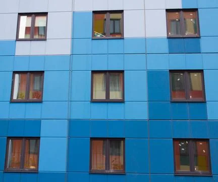 Windows of a high multi-storey building. House. windows of a new house win... Stock Photos