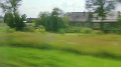 From the windows of high-speed trains on the fields (POV) Vídeos de archivo 27290940