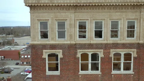 Windows in historic brick skyscraper in downtown - apartment / office / hotel Stock Footage 151874920