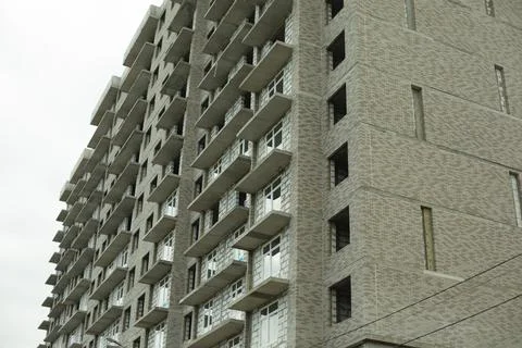 Windows of the house under construction. Construction of a building in the ci Stock Photos