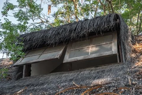 The windows of huts and trees in the background. Stock Photos