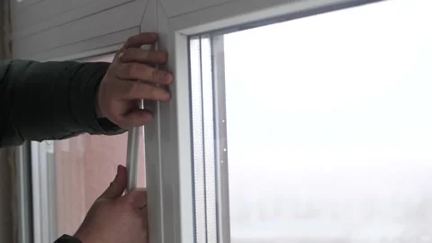 Windows installation worker, construction worker sets of plastic window. Close Видео 145831303