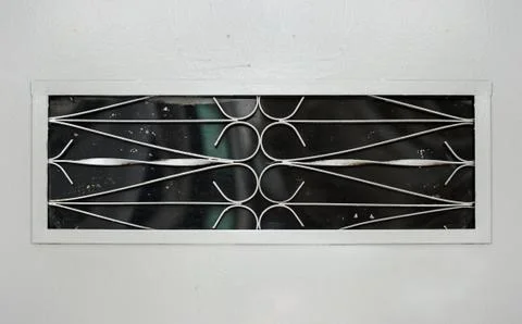 Windows with iron grating Stock Photos