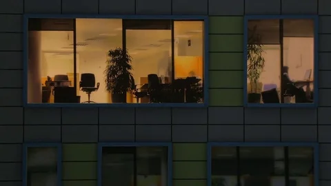 Windows light up in the house. Fragment of the layout of the building Video stock 71294576