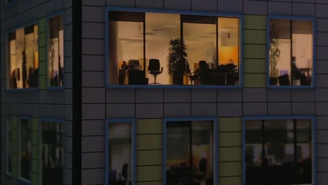 Windows light up in the house. Fragment of the layout of the building Stock Footage 71294610