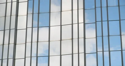 Windows of modern architecture with cloud reflections Stock Footage 208148971