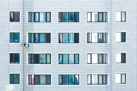 Windows on a modern white building. Stock Photos