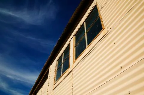 Windows on a Mteal Building Stock Photos