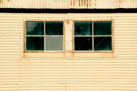 Windows on a Mteal Building Stock Photos