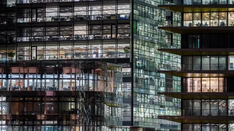 Windows of the multi-storey building of glass and steel office lighting and Stock Footage 108211296
