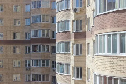 Windows of a multi-storey building Stock Photos