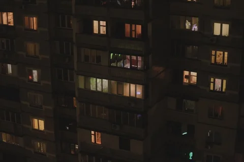 Windows of a multi-storey house at night Stock Footage 121686381