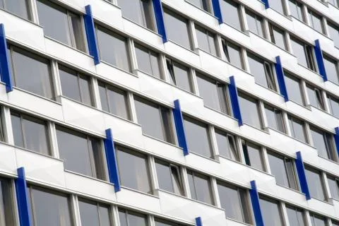 Windows of the multistory building Stock Photos