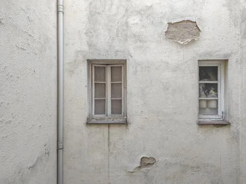 Windows in an old inner courtyard Stock Photos