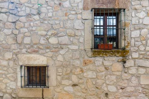 Windows in old stone house Fotos de archivo