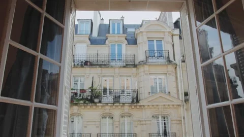 Windows opening on a parisian facade Stock Footage 310874643