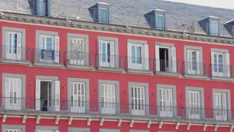 Windows with protests banners in Plaza Mayor in Madrid, Spain, September 6 2024 Stock Footage 293579398