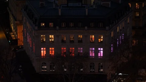 Windows with red and purple light in apartment building at night. Paris, France, Stock Footage 121622432
