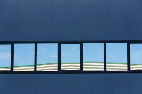 Windows with reflections in a building Stock Photos