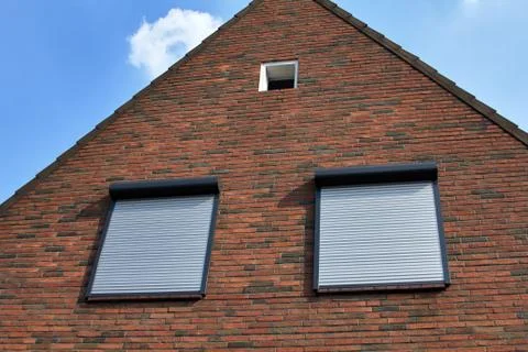 Windows with rolling shutters Stock Photos