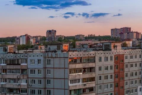 Windows, roofs and facade of an mass apartment buildings in Russia Stock Photos