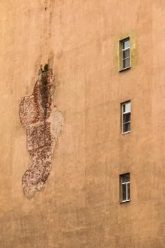 Windows in a row on facade of apartment building Stock Photos