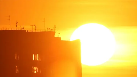 Windows shining in sunlight at top of house Stock-Footage 155433141
