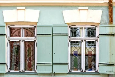 Windows with shutters. Stock Photos