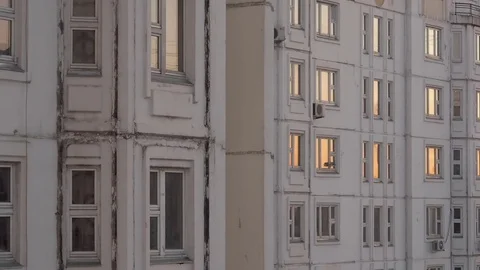 Windows at Sunset on The Usual Panel House. Moscow Dormitory Area. 動画素材 84605573