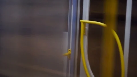 Windows of the underground carriage at the subway station, seamless loop. Moving Stock Footage 119309742