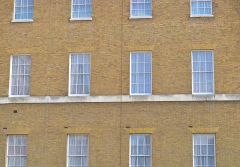 Windows on a victorian building forming a pattern 写真素材