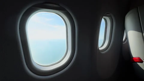 Windows view inside an airplane in the premium seat zone Video stock 297521395