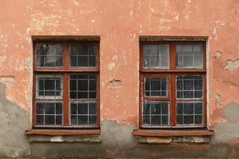 Windows on the wall of an old house Stock-Fotos