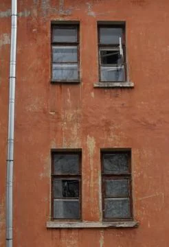 Windows on the wall of an old house 스톡 사진