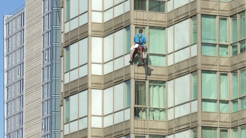 Windows washer working on heights (variant) Stock-Footage 73912658