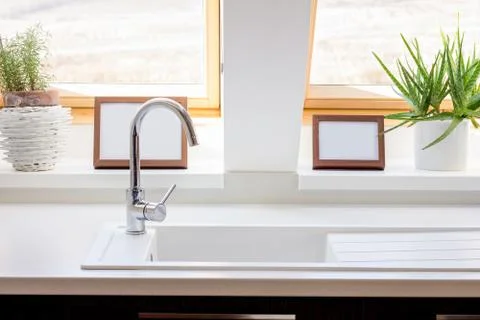 Windows in white contemporary kitchen Stock Photos