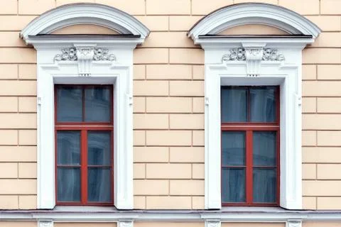 Windows with white stucco. Stock Photos