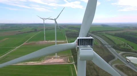 Windpark: green energy, windmill from behind, drone flight. Stock Footage 40032364
