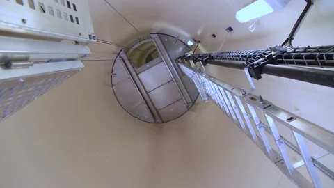 Windpipe of the turbine seen from inside the shaft with a ladder Stock Footage 222428524