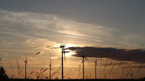 Windpower mills during sunset. Video stock 286252768