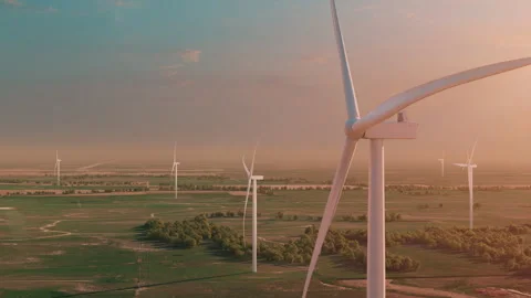 Windpower Plant Farm from above in sunset / sunrise scene Stock Footage 252174617