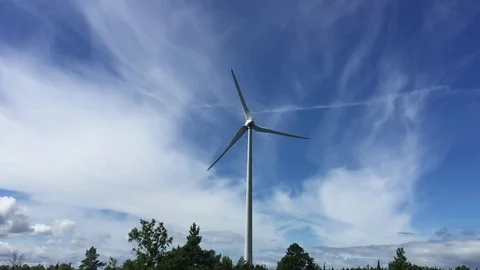 Windpower slowmo with blue and cloudy sky. Stock Footage 76999907